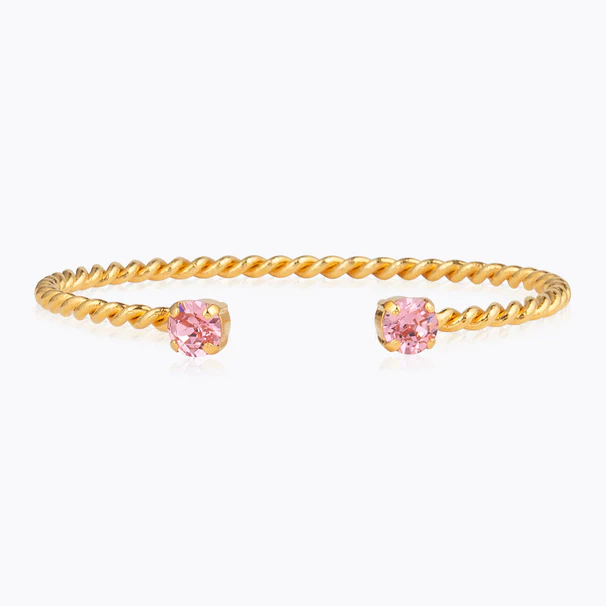 1189-mini-twist-bracelet-light-rose-Caroline-Svedbom-1054x1054-iTRADEPHOTO_606x606