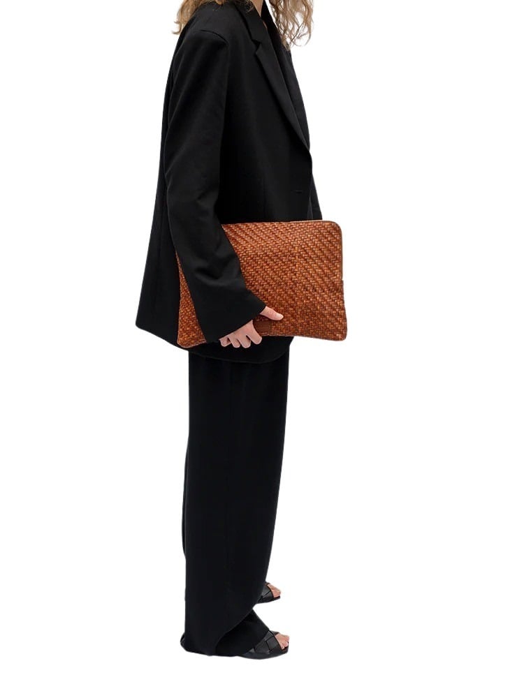 cala_jade_large_leather_pouch_on_model_2