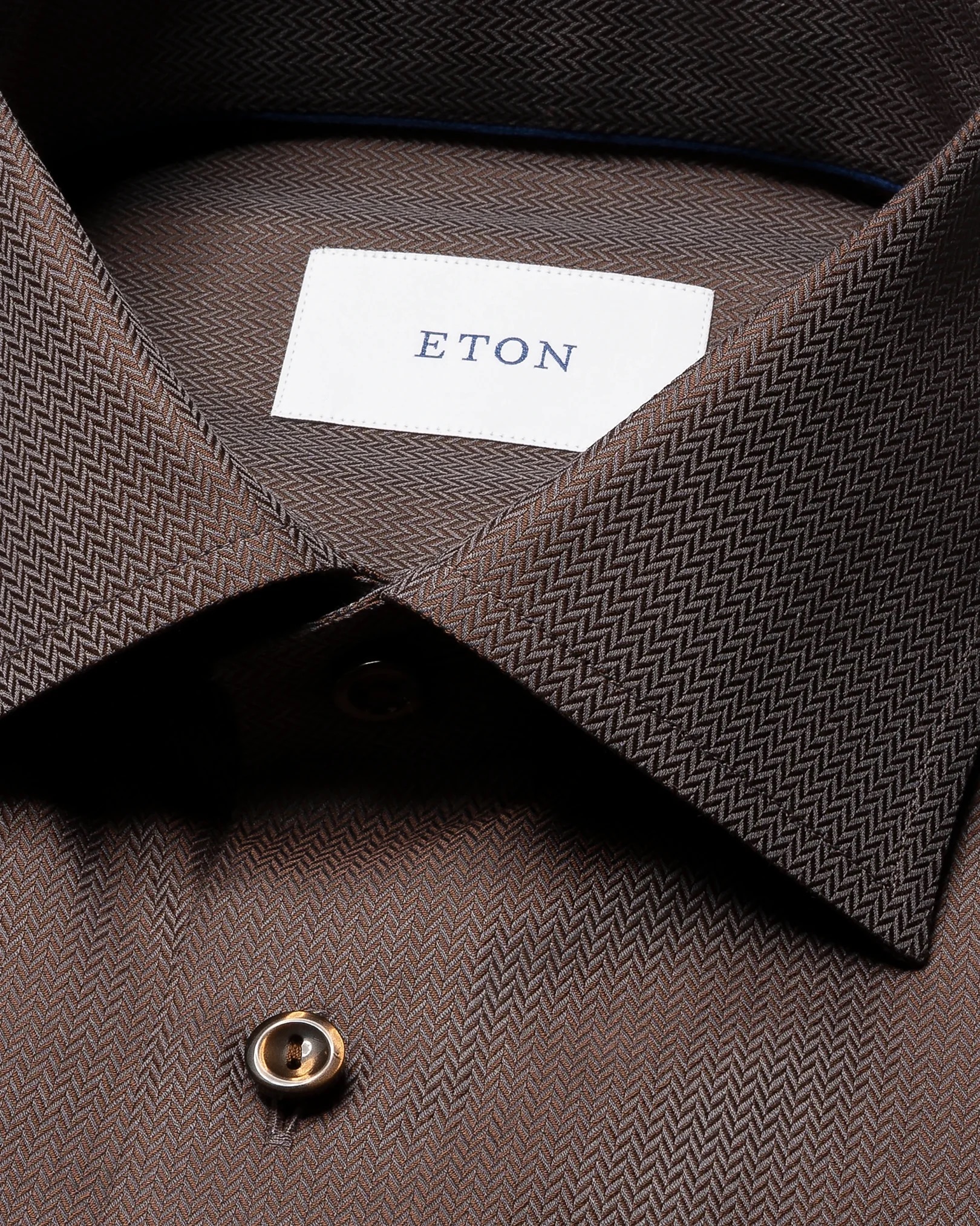 dark-brown-herringbone-signature-twill-shirt_2026-07-01t093552346z dark-brown-herringbone-signature-twill-shirt_2026-07-01t093552346z